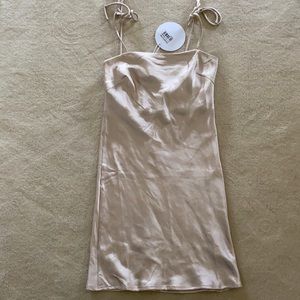 Princess Polly mini slip dress with tie straps. Gold/champagne color.
